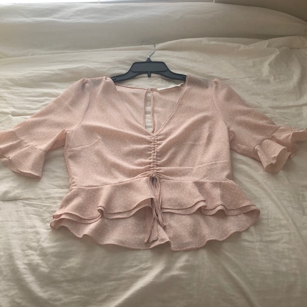Light pink peplum top